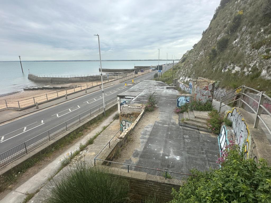 Lot: 33 - PLANNING FOR THIRTEEN SEAFRONT FLATS WITH BALCONIES AND SEA VIEWS WITH GROUND FLOOR CAFÉ - View of caf? looking towards sea